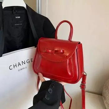 Корейская версия нишевой модной сумки для женщин 2024 года, новый простой повседневный рюкзак для поездок на работу, персонализированный студенческий рюкзак красный