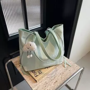 Корейская версия повседневной сумки-тоут, высококачественная вместительная женская сумка 2024 года, новый простой и универсальный рюкзак чёрный