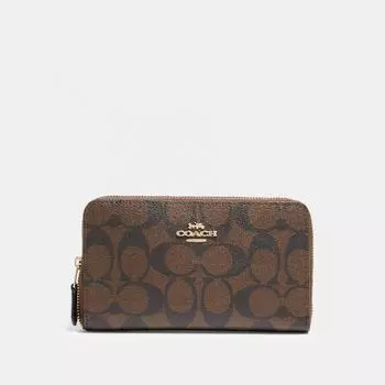 Кошелек Coach среднего размера на молнии из канвы Signature