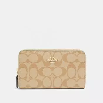 Кошелек Coach среднего размера на молнии из канвы Signature