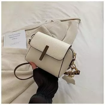 Кожаная женская сумка, новинка 2022 года, летняя модная сумка через плечо, кожаная маленькая сумка, модная универсальная нишевая сумка через плечо чёрный