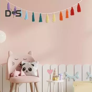 Красивая подвесная гирлянда с кисточками. Привлекательная настенная гирлянда с кисточками в скандинавском стиле. разноцветный