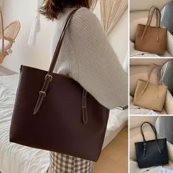 Красивая женская сумка с регулируемой пряжкой. Простая организация стиля.