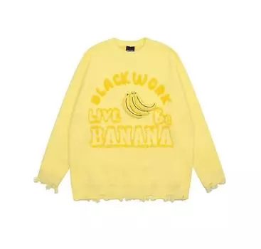 Кремово-желтый пуловер с объемным рисунком банана