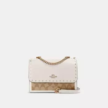Кроссбоди Coach Klare из канвы Signature с заклепками, золотистый, светлый, хаки, разноцветный