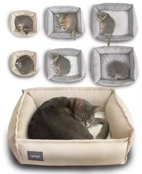 Кровать для кошек цианового цвета, разработанная дизайнером интерьера. Стильный квадратный дизайн, учитывающий особенности кошек. Множество набивки обеспечивает комфорт. бежевый