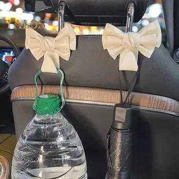 Крючки-бабочки для автомобиля Милый бант-крючок для спинки сиденья автомобиля Вешалка Прочный бант-крючок для кошелька Компактные автомобильные аксессуары коричневый