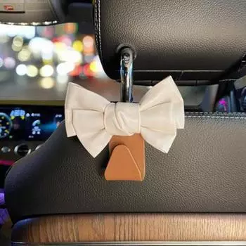 Крючок для подголовника автомобиля Крючки для сумочки автомобиля Крючок для держателя ключей в виде банта Вешалка Симпатичные вешалки для подголовника автомобиля Крючки для автомобиля Креативный автомобиль коричневый