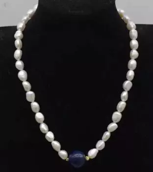 Круглое колье из пресноводного жемчуга в стиле барокко и ляписа диаметром 16 мм и длиной 17 дюймов.