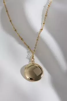 Круглое колье золотого цвета с зеленой эмалированной крышкой, подходящее для двустороннего использования