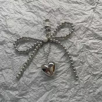 Кулон для сумки в виде бантика и сердца, с бусинами, серебристый бант, украшение для сумочки, рюкзака, аксессуары для сумок one size серебряный