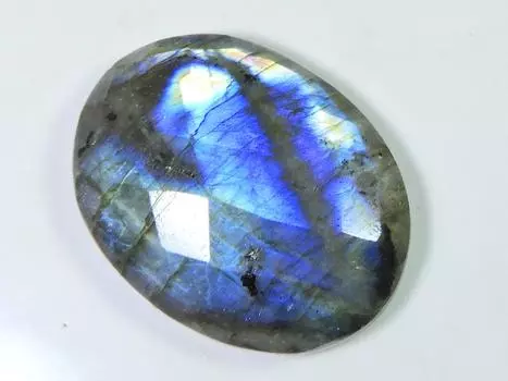 Лабрадорит овальный граненый ограненный кристалл россыпью натуральный драгоценный камень 32X43X10MM SK-1326