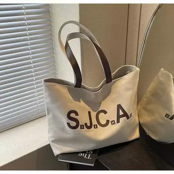 Large capacity canvas bag women s 2024 new shoulder bag casual versatile tote work universal bag