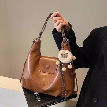 Large Capacity Tote Bag Women s 2025 New Summer High end Elegant Light Luxury Niche Advanced Commuter Backpack Brown Collection Pendant