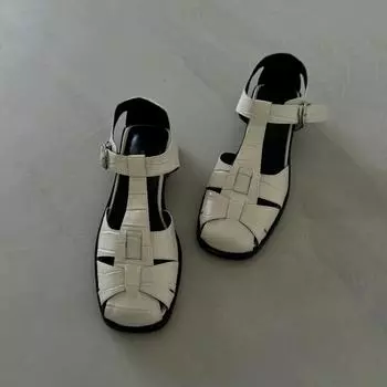 Leather retro sandals women s summer low-heeled flat-bottomed pig cage shoes hollow casual bag head sandals 34