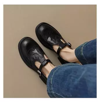 Leather round head carved small leather shoes women s 2025 new commuter niche light luxury loafers medium thick heel retro single shoes 34