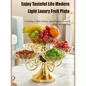 Легкая роскошная многослойная вращающаяся хрустальная тарелка для фруктов в европейском стиле. Многослойная хрустальная тарелка для фруктов в европейском стиле.