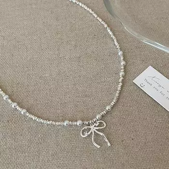 Легкое роскошное высококачественное серебряное жемчужное ожерелье-бантик для женщин, простая элегантность, мода, универсальная цепочка на шею, цепочка на ключицу