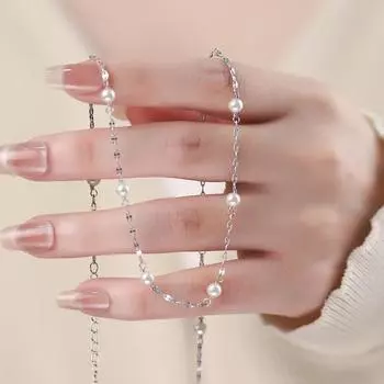 Легкое роскошное жемчужное ожерелье для женщин с чувством высококлассного дизайна, элегантным темпераментом и простой цепочкой на ключицу