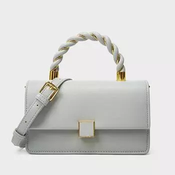 Летние женские сумки легко сочетаются с небольшими квадратными сумками в форме переплетенных граней, модными светскими сумками и сумками через плечо на одно плечо. чёрный