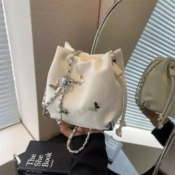 Летняя популярная сумка-ведро с бантом, нишевый дизайн, модная универсальная сумка на плечо в иностранном стиле, переносная сумка-мессенджер с завязками 18*12*17 серебряный