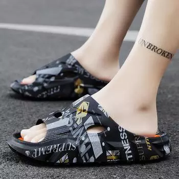 Лето 2024 года, новые мужские односложные тапочки с открытым носком, пляжная обувь с отверстиями, пара наступает на дерьмо, ощущение большого размера, классные тапочки 38 чёрный