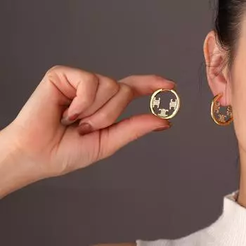 Light luxury celebrity fashion atmosphere high sense earrings pattern hollow zircon ear buckle high sense earrings fashion