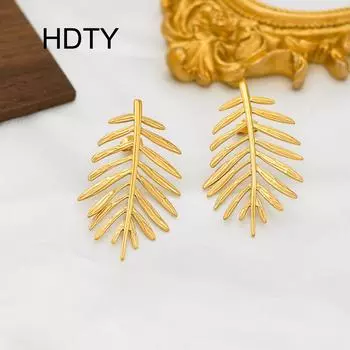 Light luxury fashion retro element leaf 18k gold stud earrings simple natural temperament high sense titanium steel earrings золотой