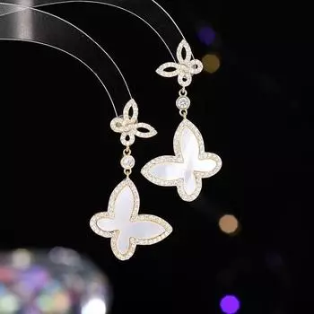 Light luxury super fairy white fritillary butterfly earrings women s fashion high sense temperament niche design sense silver needle earrings серебряный