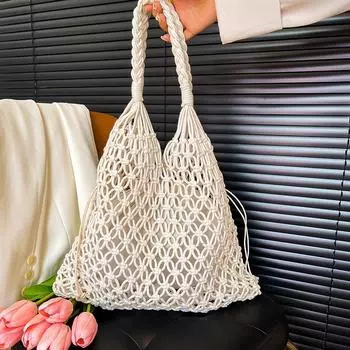 Маленькая и нишевая женская сумка с полым дизайном, новинка 2024 года, модная тканая большая сумка, повседневная универсальная пляжная сумка