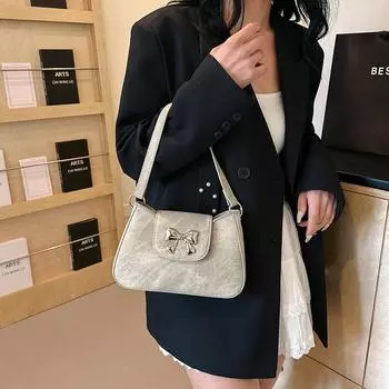 Маленькая женская сумка с французской нишей и бантом. 2024. Новая модная сумка для поездок на работу. Сумка через плечо с весенней текстурой.