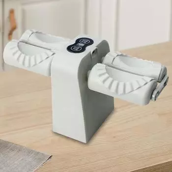 Машина для приготовления пельменей с двумя головками. Простая в использовании автоматическая бытовая машина для приготовления пельменей для дома и кухни. Для приготовления пельменей и пирогов. серый