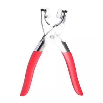 Металлические плоскогубцы для потайных пуговиц на одежде.