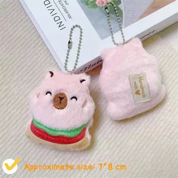 Милая плюшевая мультяшная капибара пищащая кукла брелок пушистая мягкая игрушка рюкзак подвеска амулеты очаровательный подарок для детей розовый