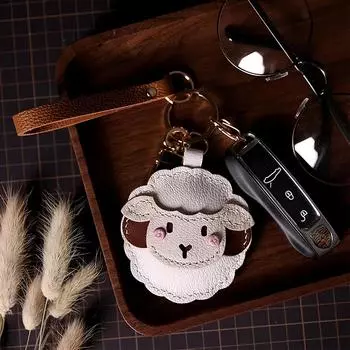 Милый кожаный кулон-брелок Овен, нишевый предмет роскоши, высококлассный декоративный брелок для ключей автомобиля, креативный подарок белый