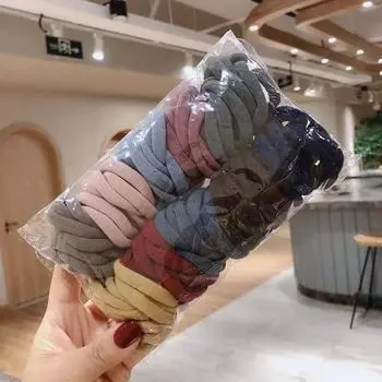 Многим нравятся высокоэластичные резинки для волос 100 штук разных цветов бесшовные резинки для волос.