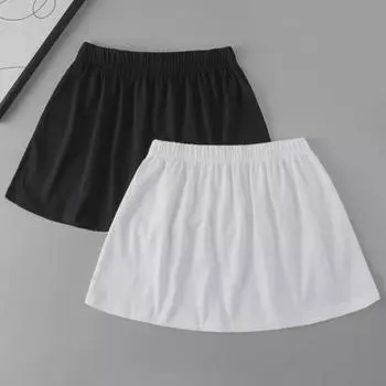 «Многослойная юбка-свитер с белой отделкой — облегающая, универсальная, закрывающая бедра»