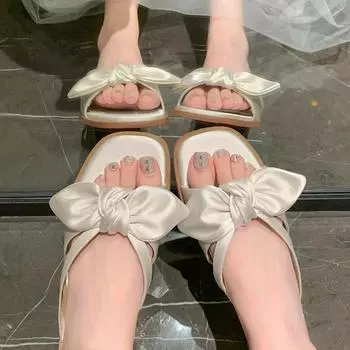мода 2024 летняя женская верхняя одежда тапочки модные сандалии на плоской подошве с бантом корейский стиль женская повседневная обувь бесплатная доставка 41-43 35 слоновая кость