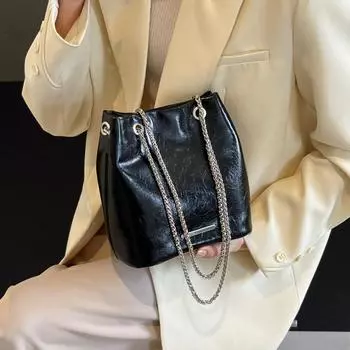 Модная и модная сумка-мешок для женской корейской версии, простая и повседневная сумка через плечо, летняя ниша 2024 года, высококачественная и универсальная женская сумка