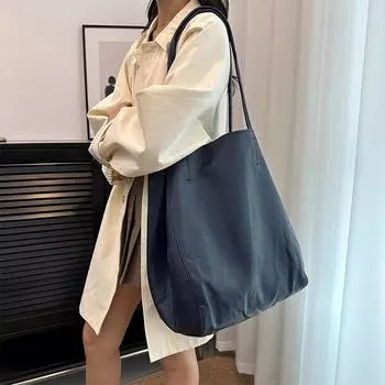 Модная и популярная сумка-тоут большой вместимости 2024 года, новая простая сумка через плечо под мышкой, офисная рабочая портативная женская сумка для поездок на работу чёрный