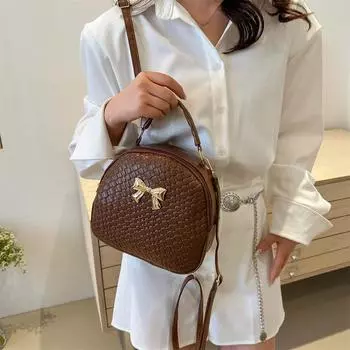 Модная маленькая круглая сумка с плетеным узором для женщин 2024 года, новый модный универсальный рюкзак большой вместимости для поездок на работу и дальнего следования через плечо чёрный