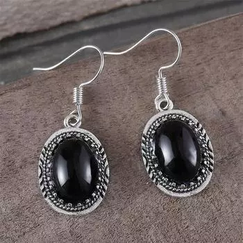 Модные модные серьги с черным камнем