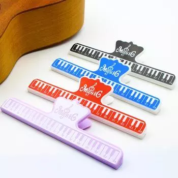 Модные пианино музыкальные клипы заметки канцелярские принадлежности файлы архив папка инструментальный инструмент экологически чистый материал нетоксичный без запаха фиолетовый