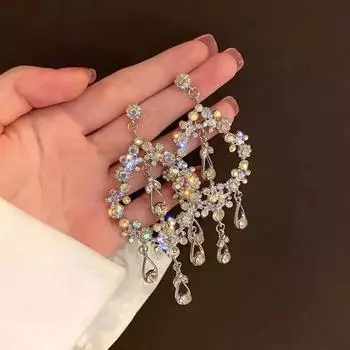 Модные преувеличенные темпераментные серьги с шипами Хуа Тэн, полые капли воды, длинные персонализированные серьги с кисточками, женские подарки