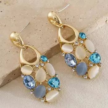 Модные серьги-подвески для женщин