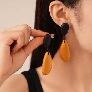 Модные серьги-подвески для женщин