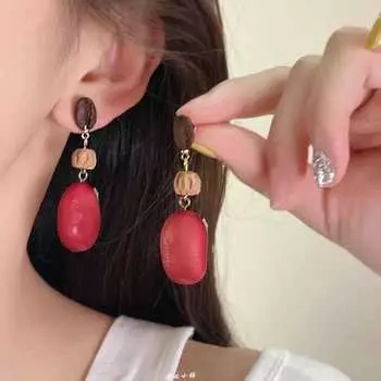 Модные серьги-подвески для женщин