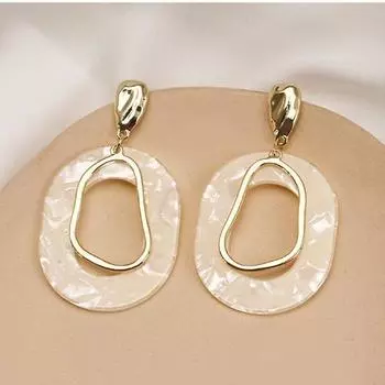 Модные серьги-подвески для женщин