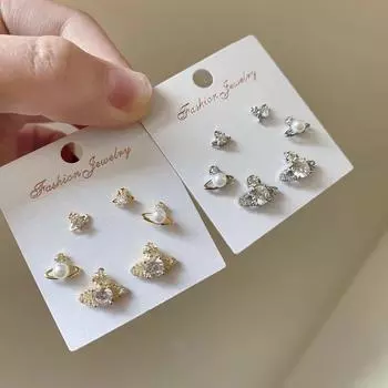 Модные серьги с микроинкрустацией цирконием и жемчугом - элегантное серебро 925 пробы, универсальные и стильные.