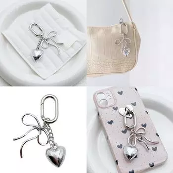 Модный кулон-шарм в виде сердца с бантом, многофункциональный брелок, текстура сплава, идеально подходит для чехла и сумки для телефона серебряный